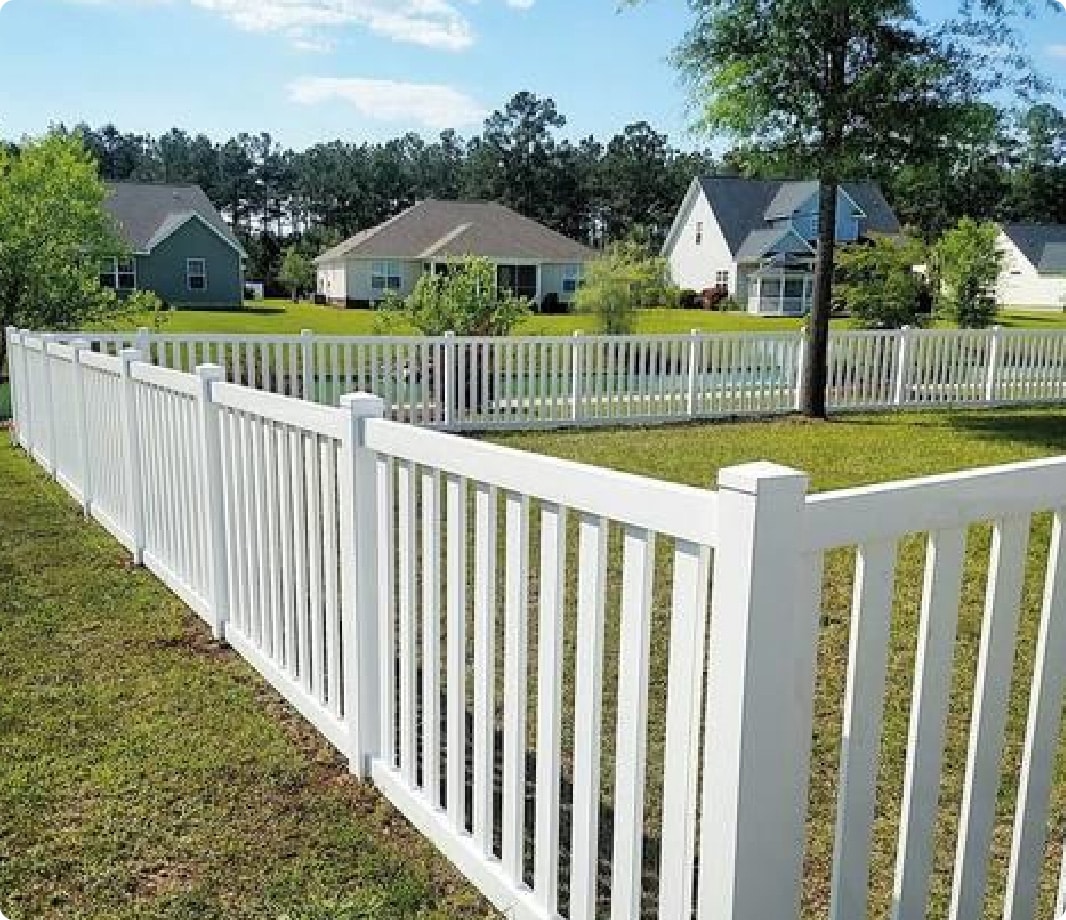 White vinyl closed picket fence