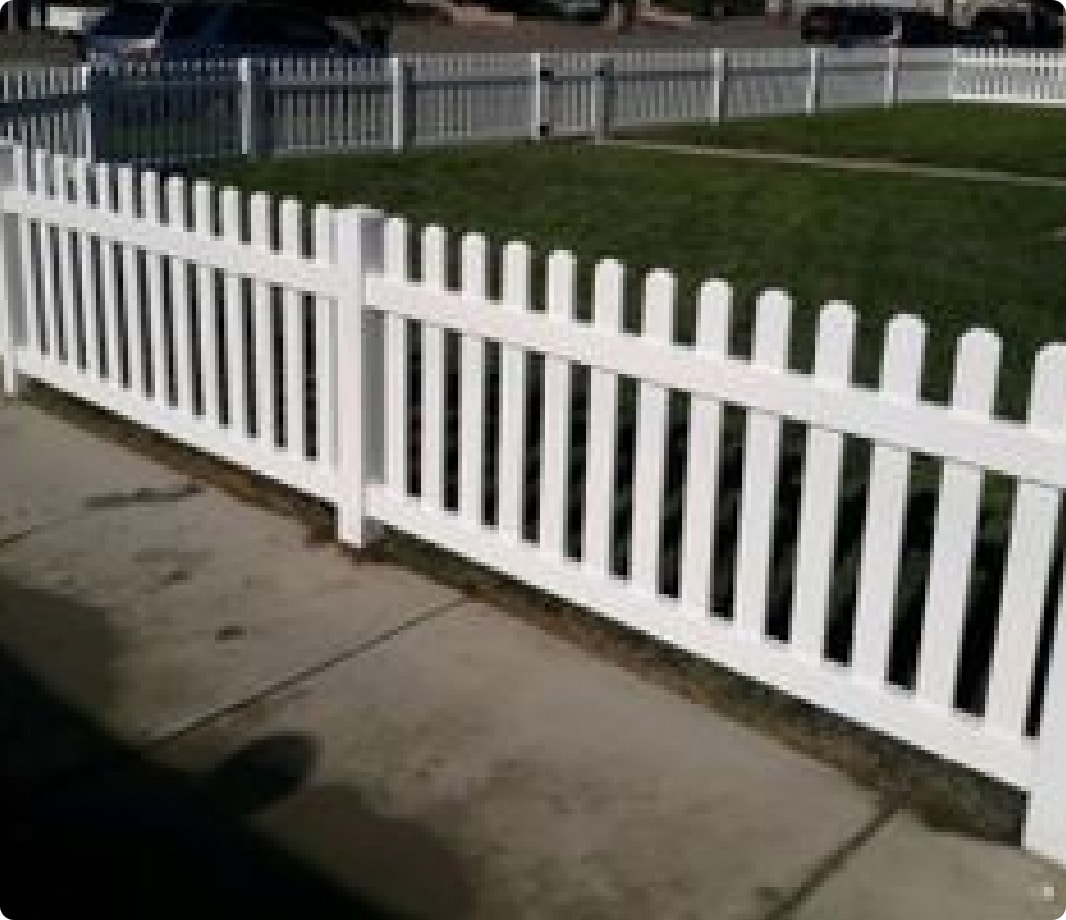 White vinyl picket fence